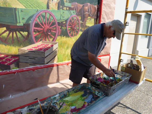 Don Gray painting the wagons
