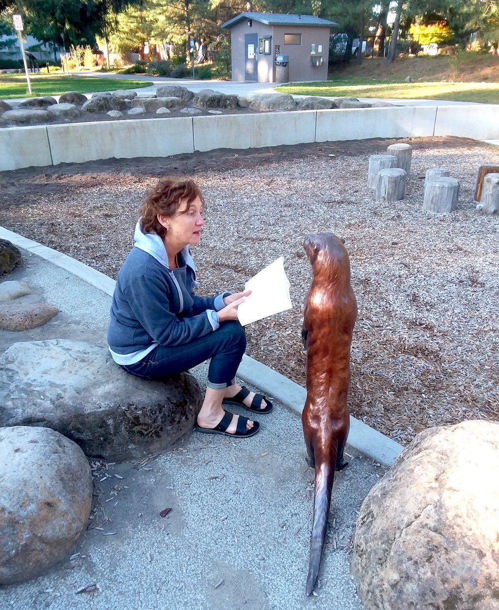 Molly Morriss from New Zealand reading to Slider.